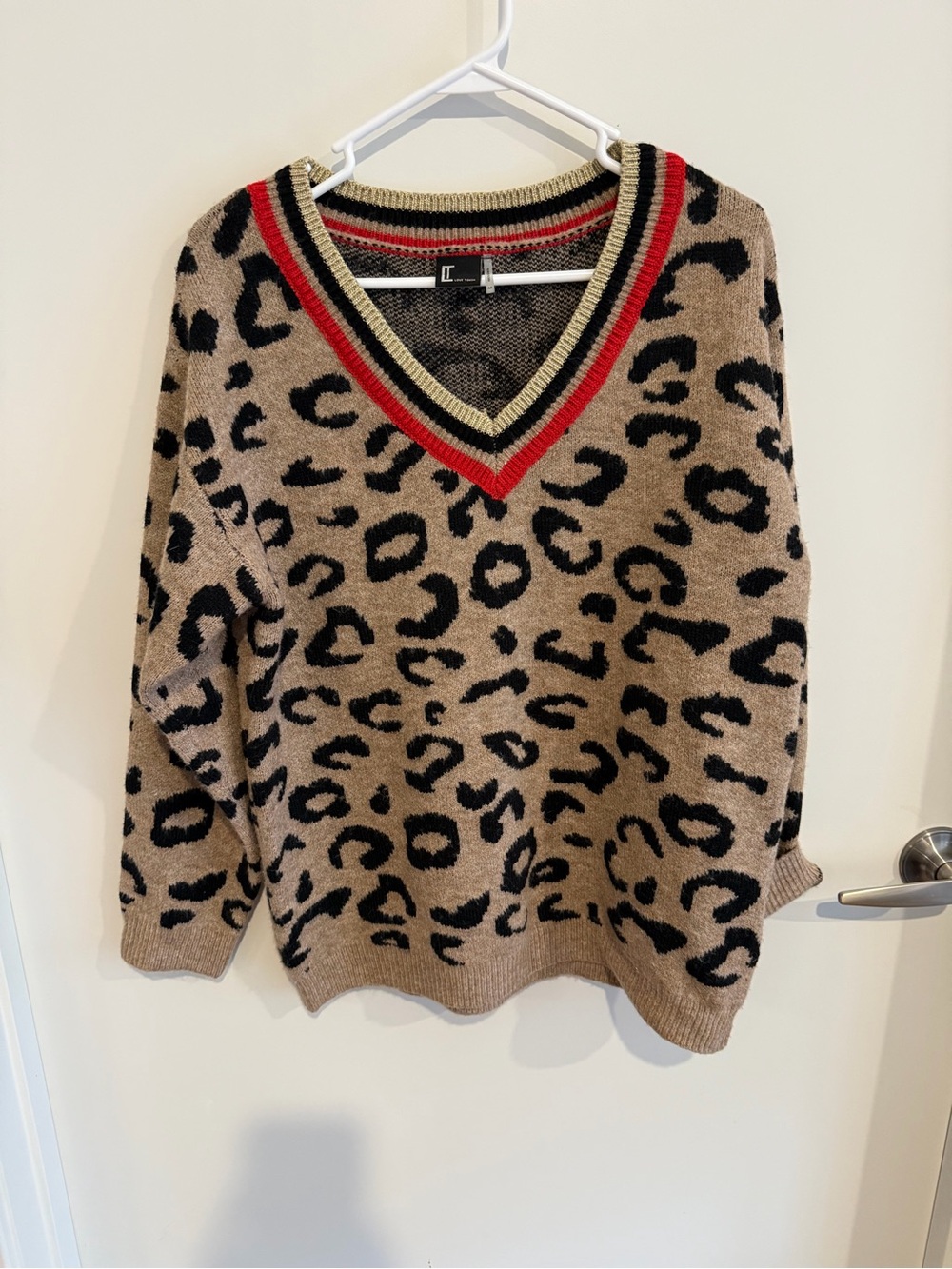 Love Token Leopard V-Neck Sweater in Tan, Black & Red Trim